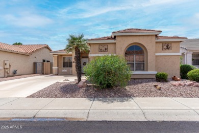 Presenting a beautifully maintained and expanded 2-bedroom plus on Arizona Traditions Golf Club in Arizona - for sale on GolfHomes.com, golf home, golf lot