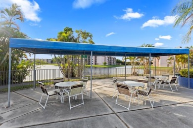 Bright and open 1/1 condo in Phase 3 of Sunrise Lakes community on Sunrise Lakes Phase III in Florida - for sale on GolfHomes.com, golf home, golf lot