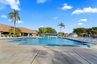 Bright and open 1/1 condo in Phase 3 of Sunrise Lakes community on Sunrise Lakes Phase III in Florida - for sale on GolfHomes.com, golf home, golf lot