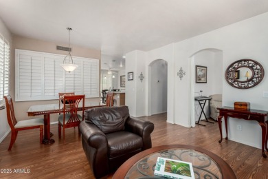 Presenting a beautifully maintained and expanded 2-bedroom plus on Arizona Traditions Golf Club in Arizona - for sale on GolfHomes.com, golf home, golf lot