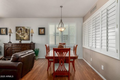 Presenting a beautifully maintained and expanded 2-bedroom plus on Arizona Traditions Golf Club in Arizona - for sale on GolfHomes.com, golf home, golf lot
