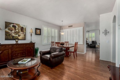 Presenting a beautifully maintained and expanded 2-bedroom plus on Arizona Traditions Golf Club in Arizona - for sale on GolfHomes.com, golf home, golf lot