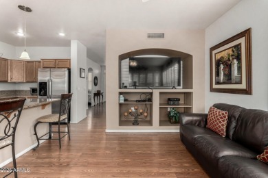 Presenting a beautifully maintained and expanded 2-bedroom plus on Arizona Traditions Golf Club in Arizona - for sale on GolfHomes.com, golf home, golf lot