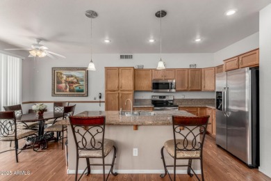 Presenting a beautifully maintained and expanded 2-bedroom plus on Arizona Traditions Golf Club in Arizona - for sale on GolfHomes.com, golf home, golf lot