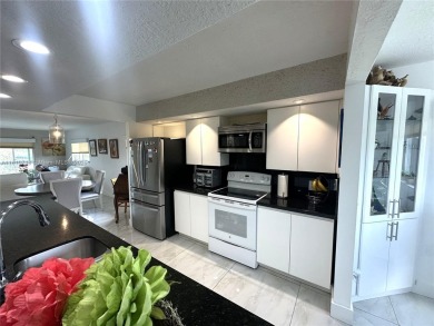 Completely remodeled 55+ condo, 2/2 Open concept 1,533 square on Flamingo Lakes Country Club in Florida - for sale on GolfHomes.com, golf home, golf lot