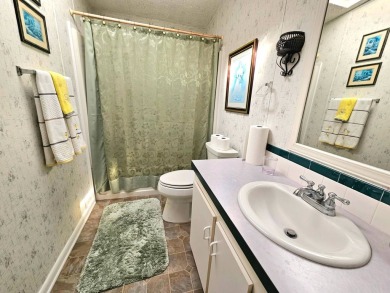 This home is on leased land. Buyers do not own the land. This on Big Cypress Golf and Country Club in Florida - for sale on GolfHomes.com, golf home, golf lot