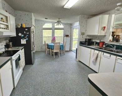This home is on leased land. Buyers do not own the land. This on Big Cypress Golf and Country Club in Florida - for sale on GolfHomes.com, golf home, golf lot