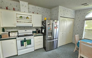 This home is on leased land. Buyers do not own the land. This on Big Cypress Golf and Country Club in Florida - for sale on GolfHomes.com, golf home, golf lot