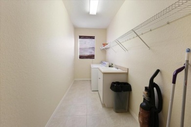 Welcome to this beautifully maintained 3-bedroom, 2-bathroom on Rotonda Golf and Country Club - Long Marsh  in Florida - for sale on GolfHomes.com, golf home, golf lot
