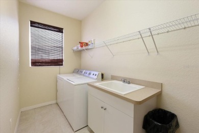 Welcome to this beautifully maintained 3-bedroom, 2-bathroom on Rotonda Golf and Country Club - Long Marsh  in Florida - for sale on GolfHomes.com, golf home, golf lot