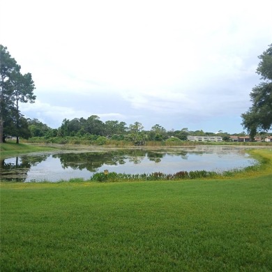 Two bedroom, one and a half bath second floor condominium on Country Club At Silver Springs Shores in Florida - for sale on GolfHomes.com, golf home, golf lot