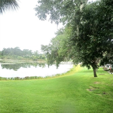 Two bedroom, one and a half bath second floor condominium on Country Club At Silver Springs Shores in Florida - for sale on GolfHomes.com, golf home, golf lot