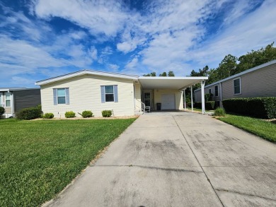 This home is on leased land. Buyers do not own the land. This on Big Cypress Golf and Country Club in Florida - for sale on GolfHomes.com, golf home, golf lot