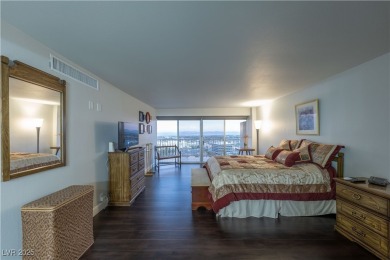 Welcome to a thoughtfully refined private corner unit, situated on Las Vegas Country Club in Nevada - for sale on GolfHomes.com, golf home, golf lot