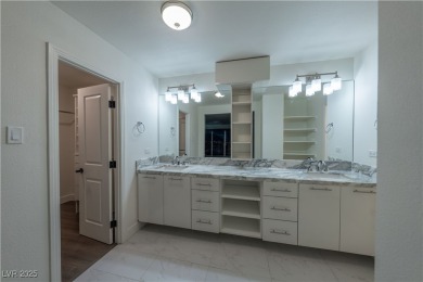 Welcome to a thoughtfully refined private corner unit, situated on Las Vegas Country Club in Nevada - for sale on GolfHomes.com, golf home, golf lot