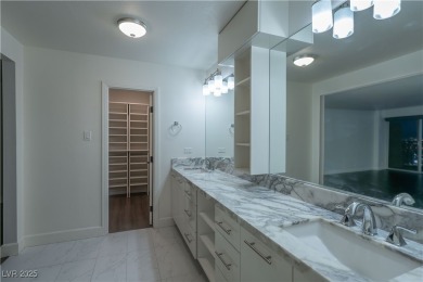 Welcome to a thoughtfully refined private corner unit, situated on Las Vegas Country Club in Nevada - for sale on GolfHomes.com, golf home, golf lot