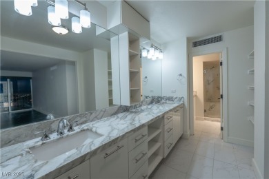 Welcome to a thoughtfully refined private corner unit, situated on Las Vegas Country Club in Nevada - for sale on GolfHomes.com, golf home, golf lot
