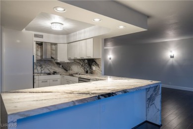 Welcome to a thoughtfully refined private corner unit, situated on Las Vegas Country Club in Nevada - for sale on GolfHomes.com, golf home, golf lot