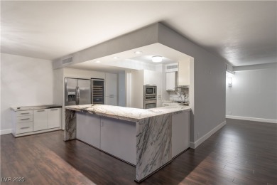 Welcome to a thoughtfully refined private corner unit, situated on Las Vegas Country Club in Nevada - for sale on GolfHomes.com, golf home, golf lot