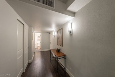 Welcome to a thoughtfully refined private corner unit, situated on Las Vegas Country Club in Nevada - for sale on GolfHomes.com, golf home, golf lot