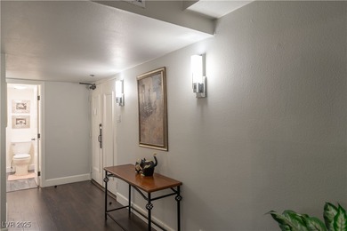 Welcome to a thoughtfully refined private corner unit, situated on Las Vegas Country Club in Nevada - for sale on GolfHomes.com, golf home, golf lot