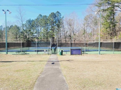 This flat, wooded lot 40 off Stillwaters Drive offers the on Stillwaters Golf and Country Club in Alabama - for sale on GolfHomes.com, golf home, golf lot