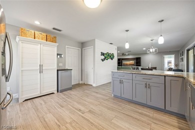 Move-In Ready Home Backing to Six Mile Cypress Slough Preserve on Eagle Ridge Golf and Tennis Club in Florida - for sale on GolfHomes.com, golf home, golf lot