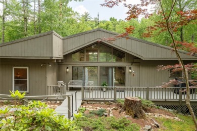 Discover a captivating retreat in Holly Forest with this classic on Sapphire National Golf Club in North Carolina - for sale on GolfHomes.com, golf home, golf lot