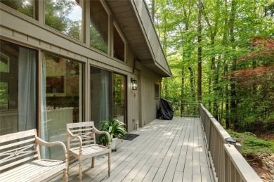 Discover a captivating retreat in Holly Forest with this classic on Sapphire National Golf Club in North Carolina - for sale on GolfHomes.com, golf home, golf lot