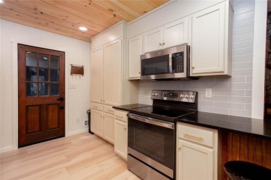 Nestled on a desirable corner lot near the North Gate, this on The Highlands Course at Lake Arrowhead in Georgia - for sale on GolfHomes.com, golf home, golf lot