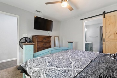 Welcome to this adorable, move-in-ready home on a large lot in on Hide-A-Way Lake Golf Course in Texas - for sale on GolfHomes.com, golf home, golf lot