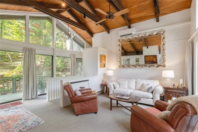 Discover a captivating retreat in Holly Forest with this classic on Sapphire National Golf Club in North Carolina - for sale on GolfHomes.com, golf home, golf lot