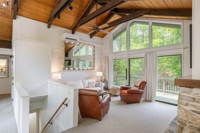 Discover a captivating retreat in Holly Forest with this classic on Sapphire National Golf Club in North Carolina - for sale on GolfHomes.com, golf home, golf lot