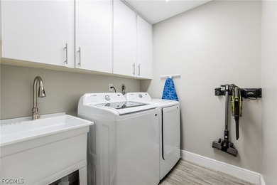 Move-In Ready Home Backing to Six Mile Cypress Slough Preserve on Eagle Ridge Golf and Tennis Club in Florida - for sale on GolfHomes.com, golf home, golf lot