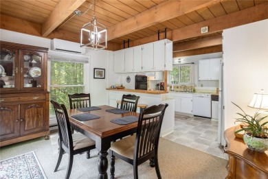 Discover a captivating retreat in Holly Forest with this classic on Sapphire National Golf Club in North Carolina - for sale on GolfHomes.com, golf home, golf lot