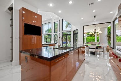 Experience breathtaking long lake views from this grand estate on St. Andrews Country Club of Boca Raton in Florida - for sale on GolfHomes.com, golf home, golf lot