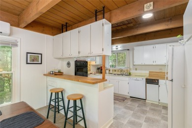 Discover a captivating retreat in Holly Forest with this classic on Sapphire National Golf Club in North Carolina - for sale on GolfHomes.com, golf home, golf lot