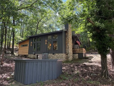 Nestled on a desirable corner lot near the North Gate, this on The Highlands Course at Lake Arrowhead in Georgia - for sale on GolfHomes.com, golf home, golf lot