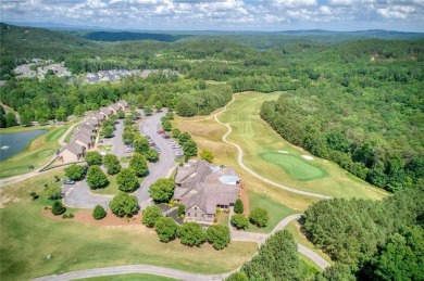 Nestled on a desirable corner lot near the North Gate, this on The Highlands Course at Lake Arrowhead in Georgia - for sale on GolfHomes.com, golf home, golf lot