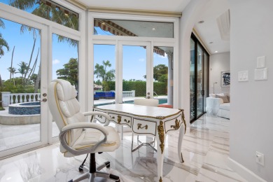 Experience breathtaking long lake views from this grand estate on St. Andrews Country Club of Boca Raton in Florida - for sale on GolfHomes.com, golf home, golf lot