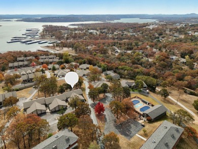 Offered at $130K as-is, this 2-bedroom, 2-bathroom condo is on Kimberling City Golf Club in Missouri - for sale on GolfHomes.com, golf home, golf lot