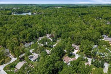 Step inside into a sprawling 1770-square-foot living space on Druid Hills Golf Club in Tennessee - for sale on GolfHomes.com, golf home, golf lot
