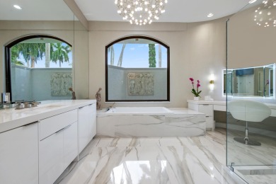 Experience breathtaking long lake views from this grand estate on St. Andrews Country Club of Boca Raton in Florida - for sale on GolfHomes.com, golf home, golf lot