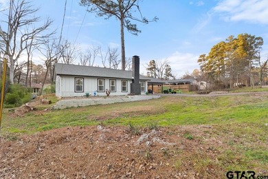 Welcome to this adorable, move-in-ready home on a large lot in on Hide-A-Way Lake Golf Course in Texas - for sale on GolfHomes.com, golf home, golf lot