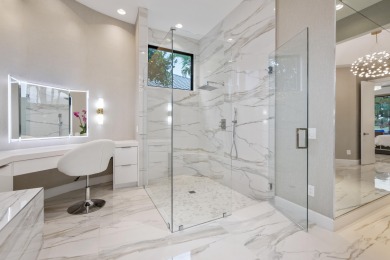 Experience breathtaking long lake views from this grand estate on St. Andrews Country Club of Boca Raton in Florida - for sale on GolfHomes.com, golf home, golf lot