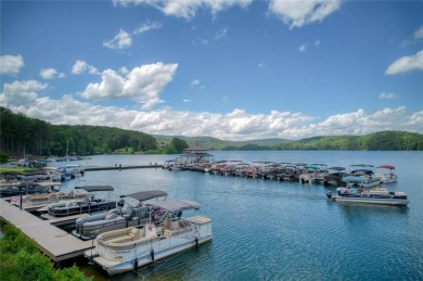 Nestled on a desirable corner lot near the North Gate, this on The Highlands Course at Lake Arrowhead in Georgia - for sale on GolfHomes.com, golf home, golf lot