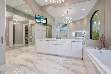 Experience breathtaking long lake views from this grand estate on St. Andrews Country Club of Boca Raton in Florida - for sale on GolfHomes.com, golf home, golf lot