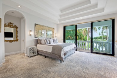 Experience breathtaking long lake views from this grand estate on St. Andrews Country Club of Boca Raton in Florida - for sale on GolfHomes.com, golf home, golf lot