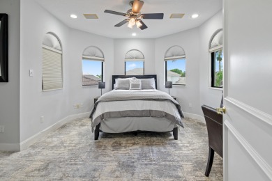 Experience breathtaking long lake views from this grand estate on St. Andrews Country Club of Boca Raton in Florida - for sale on GolfHomes.com, golf home, golf lot