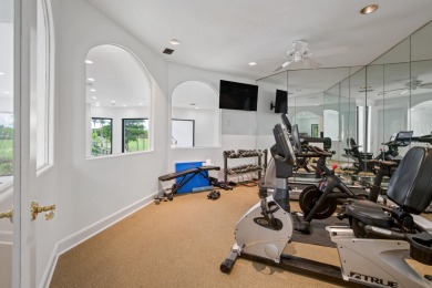Experience breathtaking long lake views from this grand estate on St. Andrews Country Club of Boca Raton in Florida - for sale on GolfHomes.com, golf home, golf lot